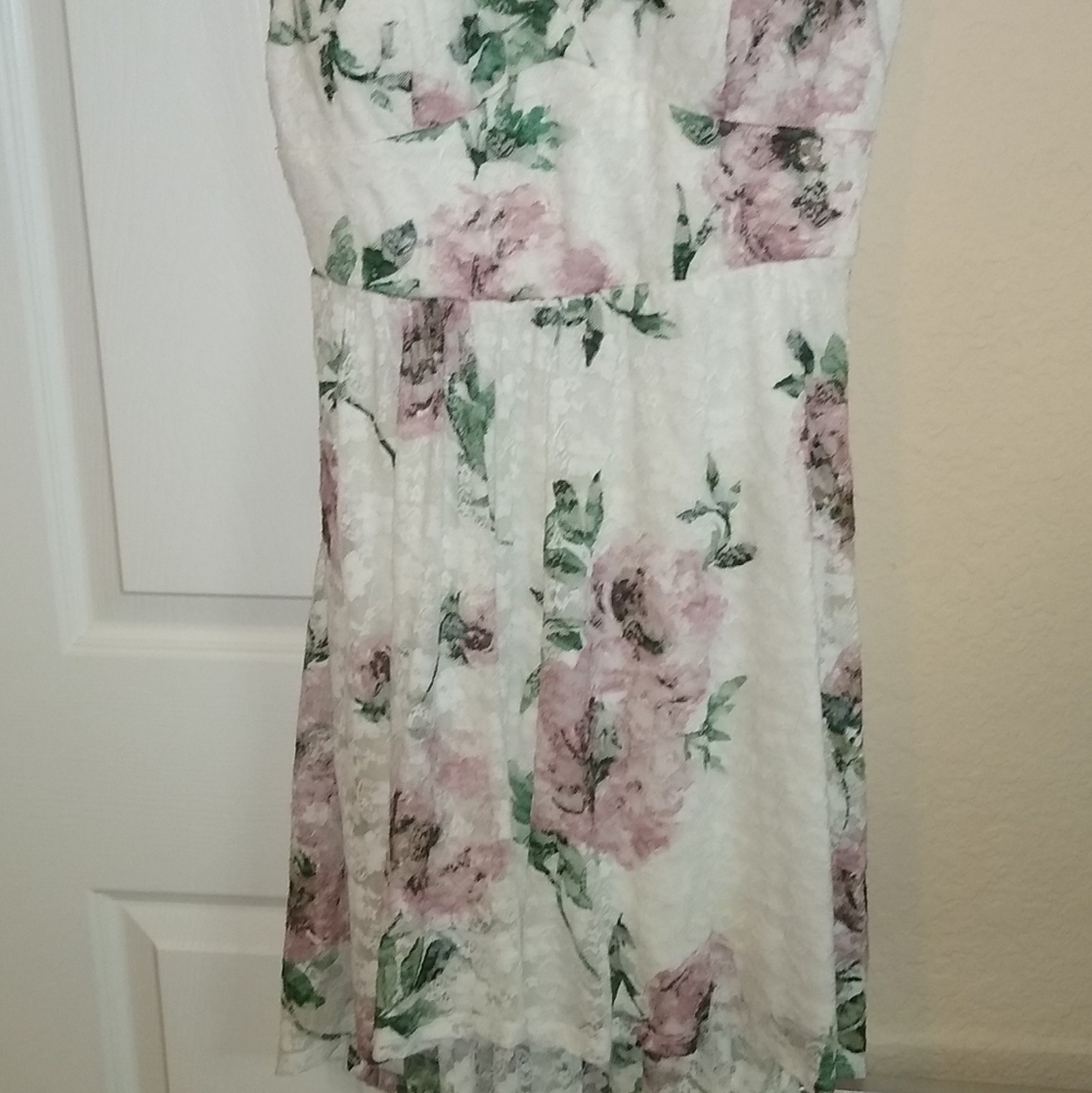 Floral flirty sun dress with longer back